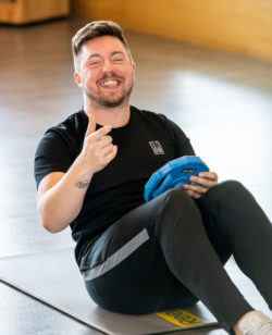 Gym instructor smiling